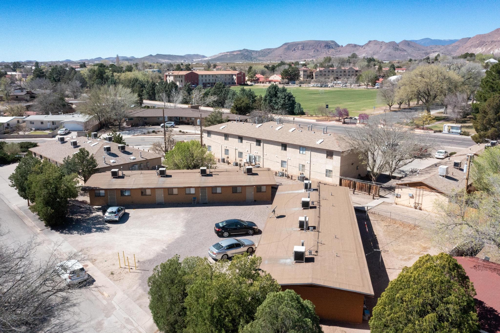 705 Bursum aerial view showing all three buildings with NM Tech campus backdrop